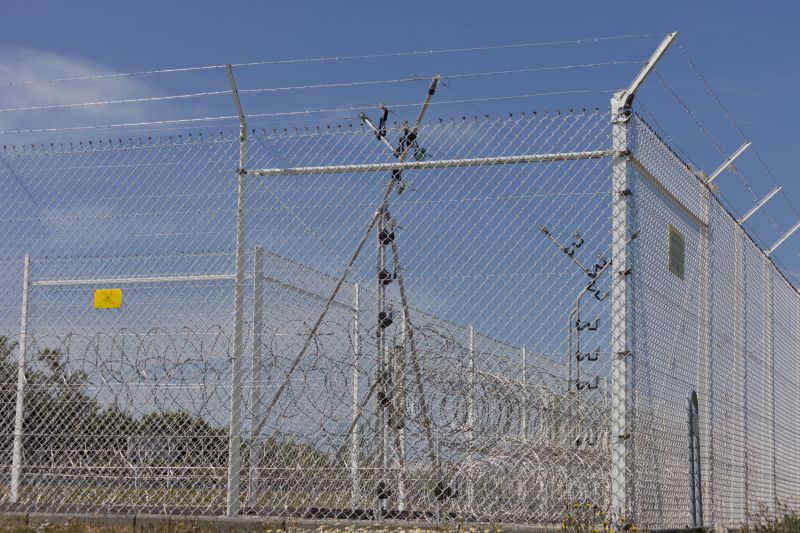 Chain Link Fence with Barbed Wire